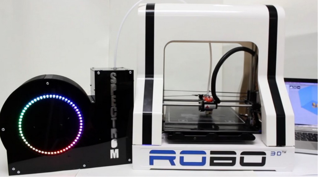 Spectrom's coloring system attached to a Robo printer. Courtesy of Spectrom.