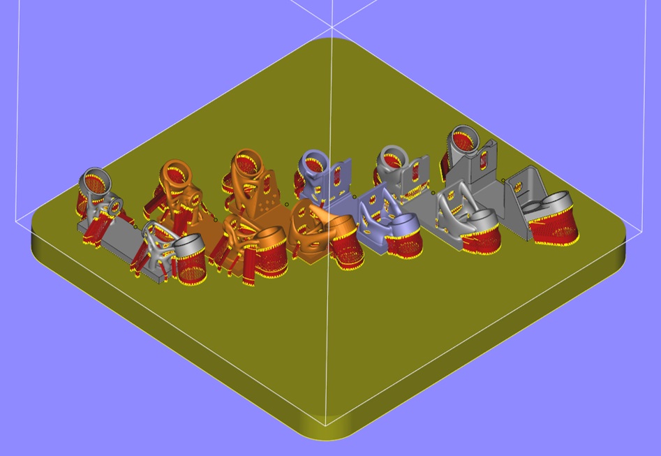 Metal parts laid out on build-plate, with support structures, for 3D printing. (Image courtesy Sintavia)