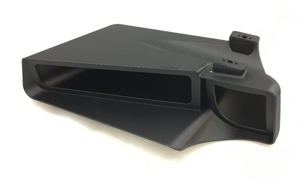 Stratasys CF mirror housing, 3D printed for reduced weight and custom positioning. (Image courtesy Stratasys)