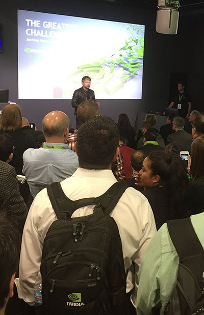 NVIDIA CEO Jen-Hsun Huang addresses SC16 attendees from the company's booth on the show floor.
