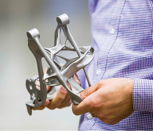 GM and Autodesk partnered to explore the use of generative design technology to redesign a seat belt bracket. Image courtesy of Autodesk.
